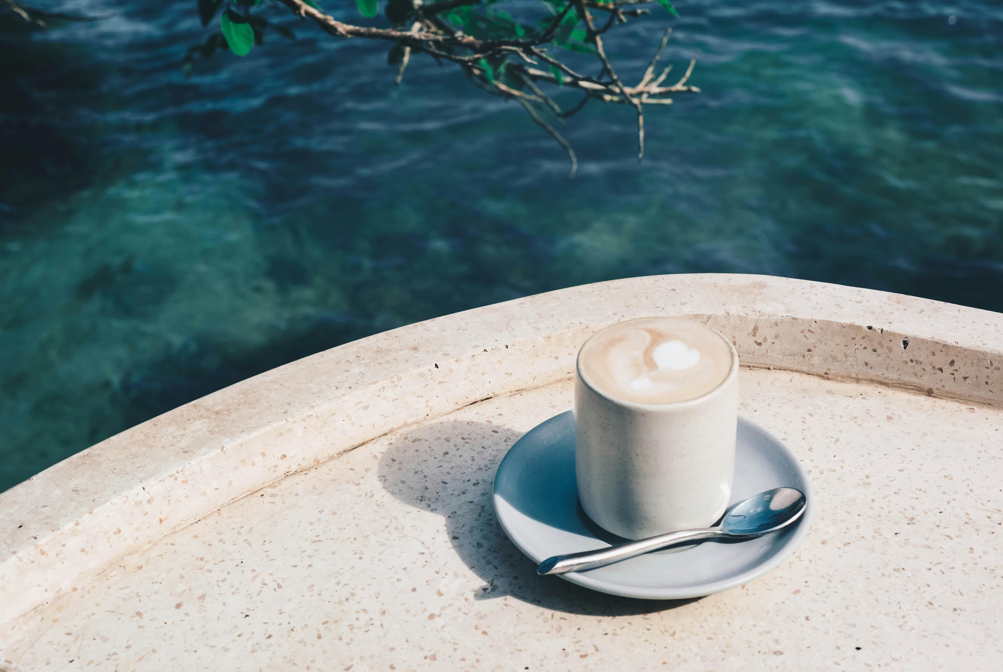 Flat white next to pool