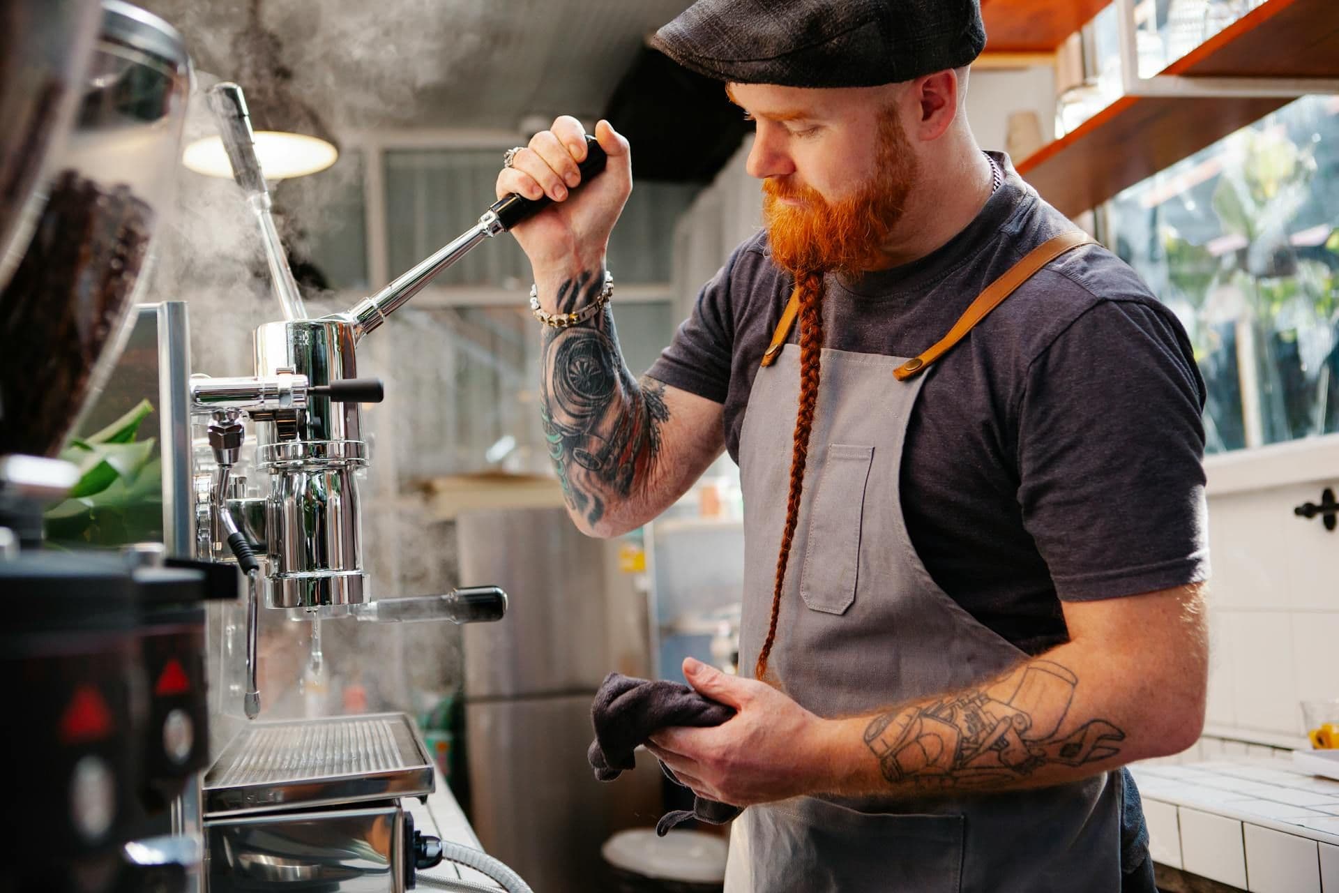 Barista preparing coffee machine